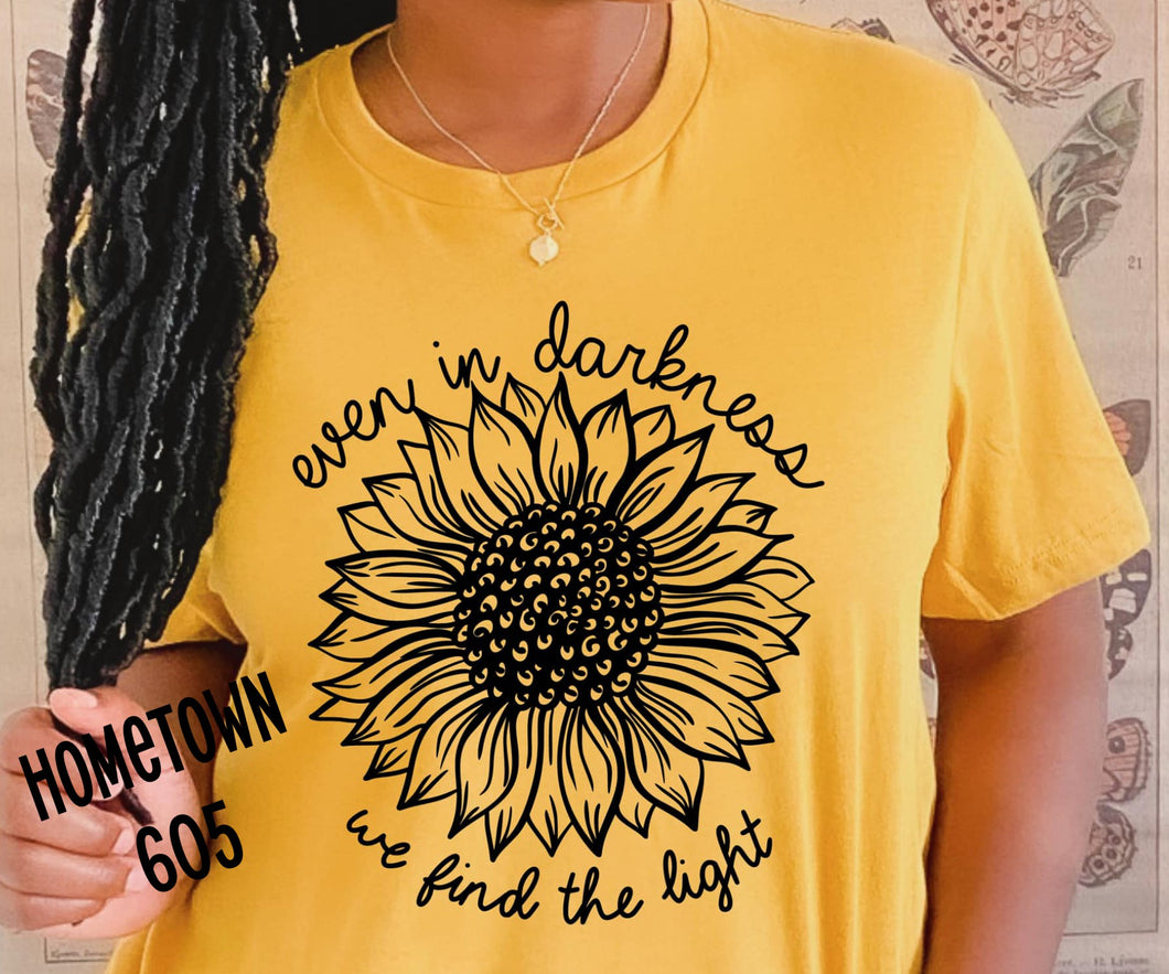 Even in the darkness, we find the light t-shirt, graphic tee